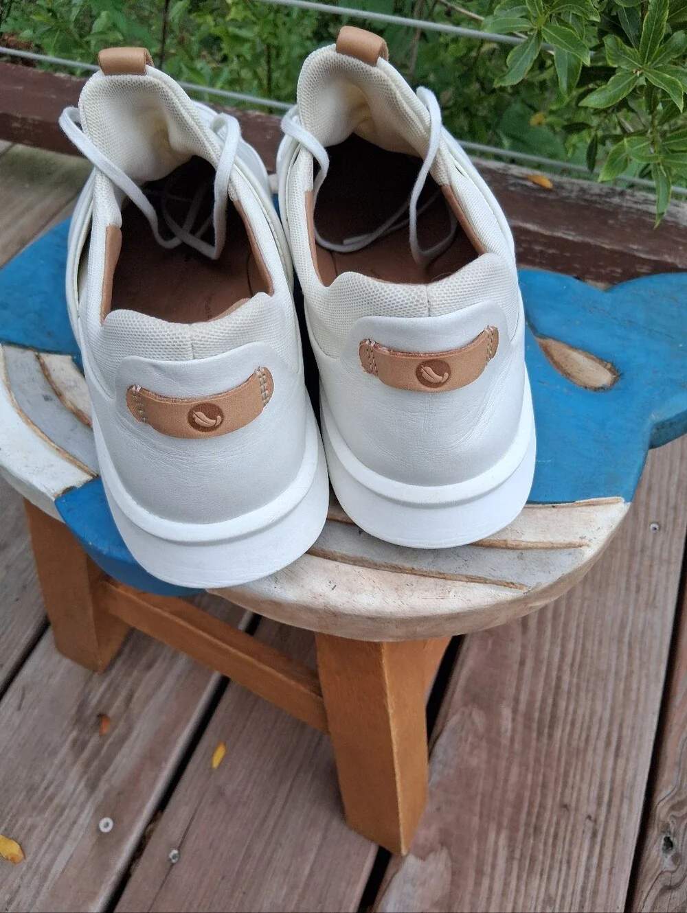 Womens White Casual Sneakers with Tan Accents. Body of Shoe Winter White.